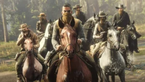 Kovbojs uz zirga jāj pa dzelzceļa sliedēm pretim braucošam tvaika lokomotīves vilcienam spēlē Red Dead Online