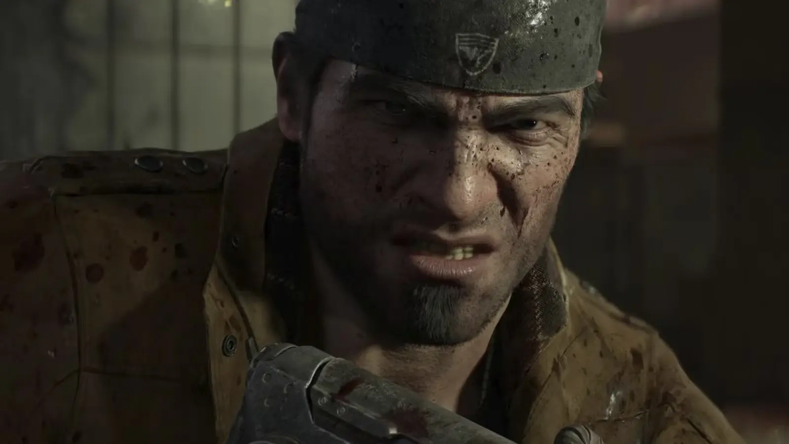 Markuss Fēnikss ar dusmīgu sejas izteiksmi un ieroci spēlē Gears of War E-Day.
