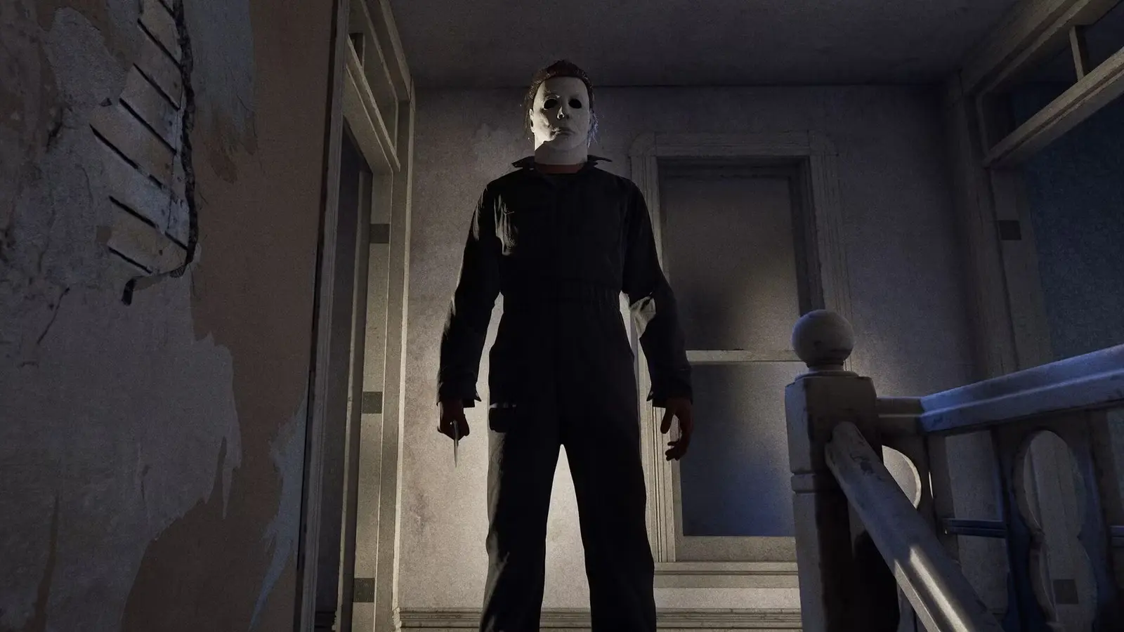 Maikls Maierss ar nazi rokā tumšā gaitenī spēlē Halloween: The Game.